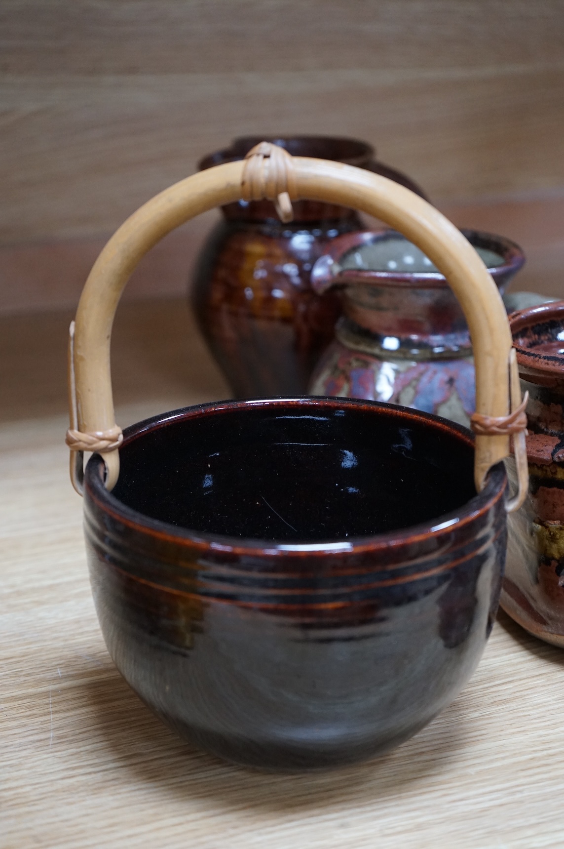A large group of 20th century signed and unsigned Studio pottery, tallest 23cm high